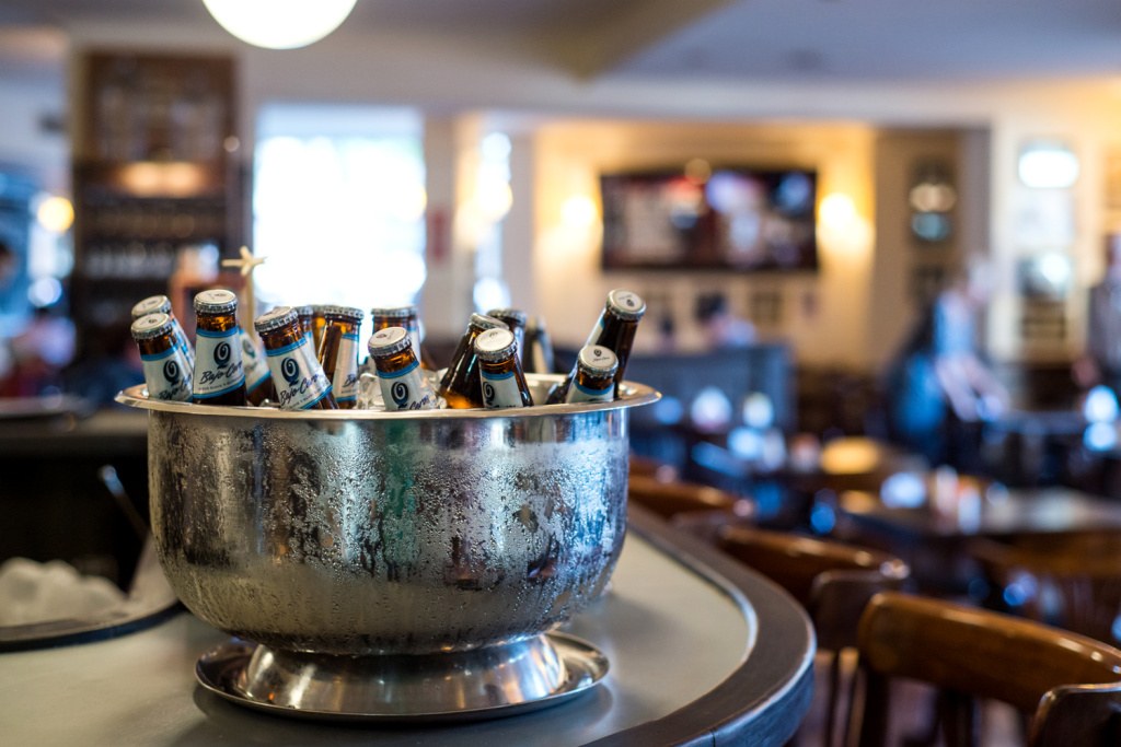 An ice-cold bucket of beer bottles