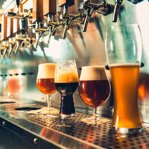 Glasses of draft beer on the bar